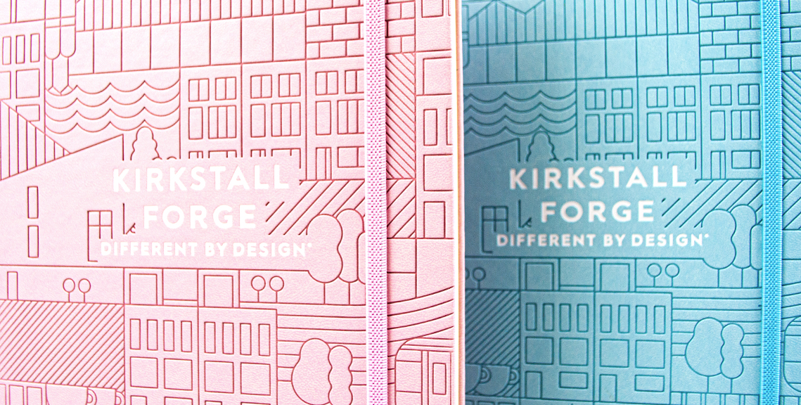 Kirkstall Forge branded notebook with 2D illustration design in pink and blue