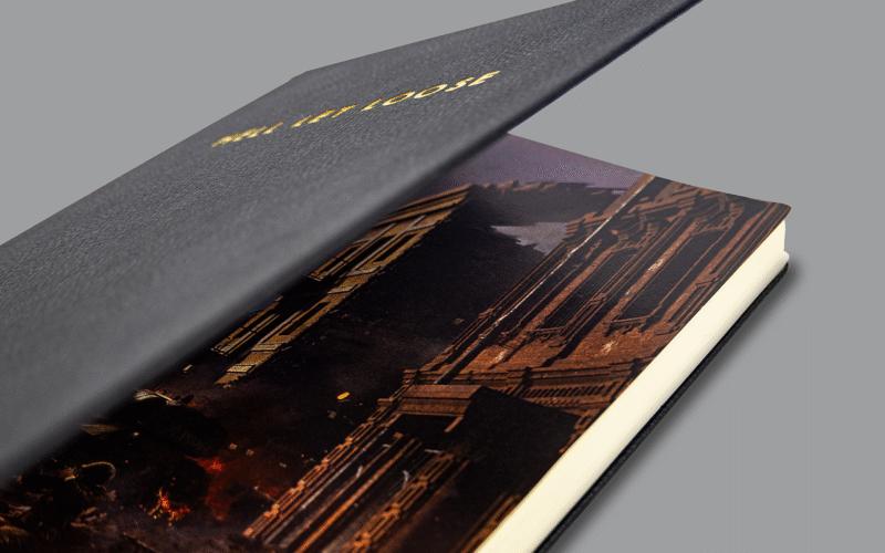 Open branded notebook for hell let loose, showing an artwork printed custom insert page.